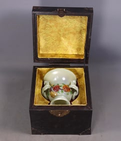 A jade vase with eight treasures and double elephant ears from Hotan