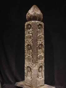 Blue stone Buddha pillar