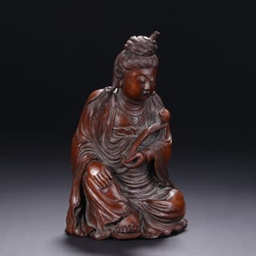 Bamboo-carved "Ruyi Guanyin" (Ruyi Bodhisattva) figurine by You Kan from the Qing Dynasty
