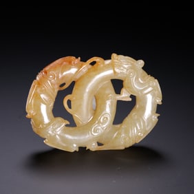 A pair of Qing Dynasty seed-pod Hetian jade double dragon pendants