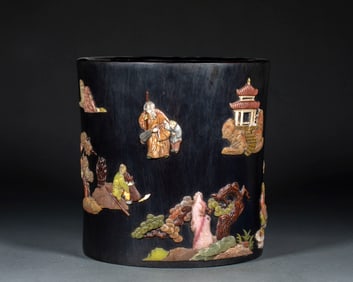 A pen holder made of rosewood with "Longevity of the Pine and Crane" and "Figures and Stories"