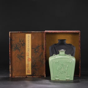 A large four-handled flat bottle with a silver rim and cloud dragon patterns from the Longquan Kiln