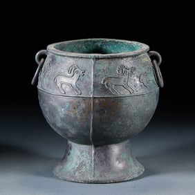 A double-handled bronze bowl with rings from before the Ming Dynasty
