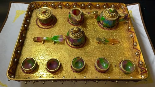 A set of gilded and inlaid multicolored jade tea sets