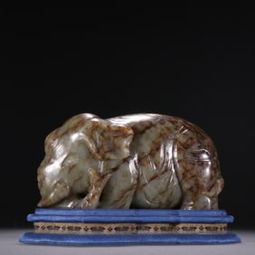 A pair of jade figurines of "Peace and Prosperity", made of Hotan jade, Qing Dynasty