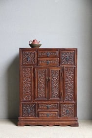 A rosewood cabinet for stationery