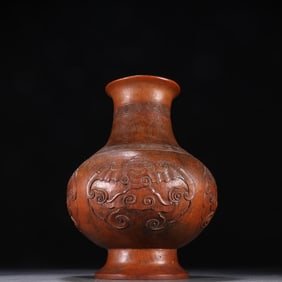 A bamboo-carved vase with the character "Fu"