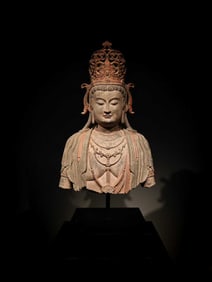 A half-length statue of Bodhisattva Guanyin in painted bluestone from the Song Dynasty