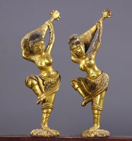 A pair of gilded pipa-playing ladies from the Northern Wei Dynasty