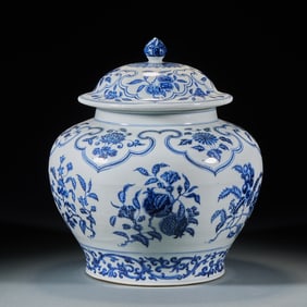 A blue and white porcelain covered jar with branch flowers and fruits