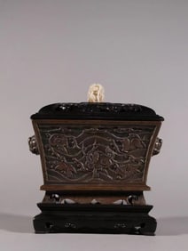 A copper incense burner with engraved sea beast patterns from the Xuande period