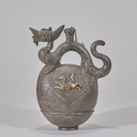 A gilded silver dragon-shaped teapot