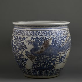 Ming - dynasty blue - and - white scroll jar with the pattern of two phoenixes bringing auspiciousne