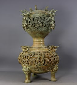 Bronze coiled dragon wine vessel from the Warring States and Han Dynasties