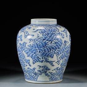 Blue - and - white jar with sea - water and dragon patterns featuring reserved white decoration, ins