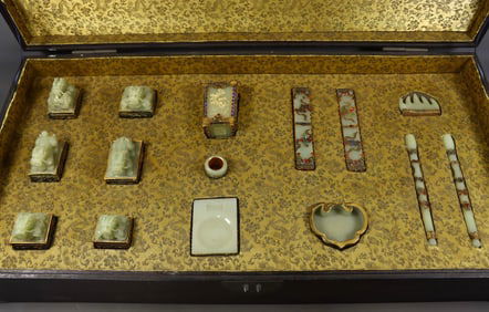 A gold-inlaid and engraved seal set, including a box for stationery
