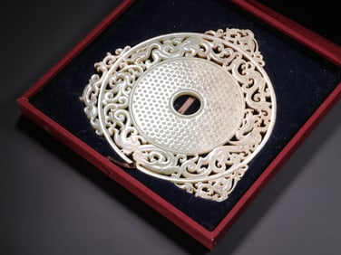 Pair of jade bi discs with dragon patterns from the Han Dynasty