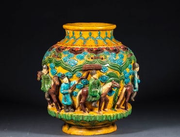 Liao Dynasty Tricolor Glazed Jar with Openwork Relief of Figure Stories