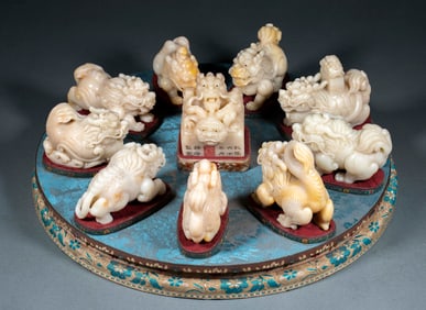Set of Qing Dynasty Qianlong Reign White Tianhuang Stone Seal Ornaments with "Nine Sons of the