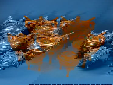 Set of Seven Gilt Bronze Tripod Cauldrons with Red Patina and Green Rust, Han Dynasty