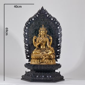 Gilt Bronze Four-Armed Guanyin with Red Sandalwood Base, Marked "Executed in the Yongle Reign of the