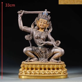 Ming Yongle Period Silver Manjushri Holding a Sword