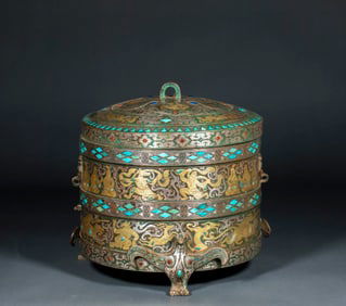 A covered jar with inlaid silver and gold and turquoise and four divine beast patterns from before