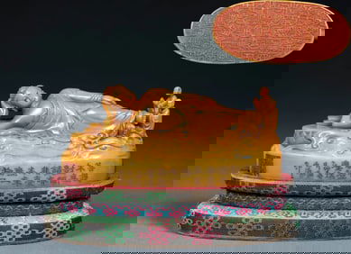 A seal of Buddha in a reclining position made of tianhuang stone from the Qing Dynasty