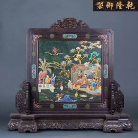 A screen with inlaid figures and stories made of rosewood