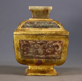 A square jar with a beast face inlaid with Hetian jade and gilded copper from the Warring States and