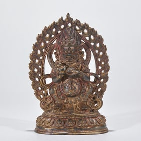 A copper statue of the God of Wealth