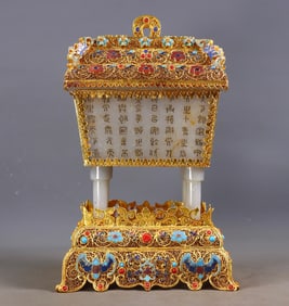 A gilded and filigreed double-eared tripod inlaid with Hetian jade