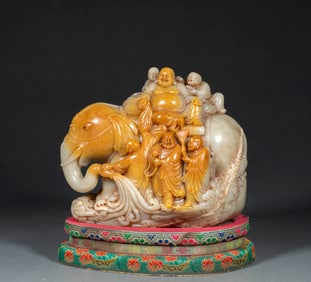 Shang Jun's Shoushan stone statue of Maitreya Buddha riding a white elephant