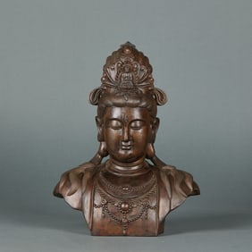A half-length statue of Guanyin made of agarwood