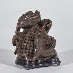 Agarwood Ornament of Lions Playing with a Silk Ball