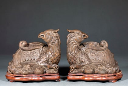 A Pair of Agarwood Phoenix Ornaments