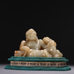 Qing Dynasty Hetian Jade Seed Carving of Arhat Playing with Lion