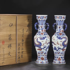 A Pair of Yuan Dynasty Blue and White Underglaze Red Zun Vases with Elephant Ears and Cloud Dragon