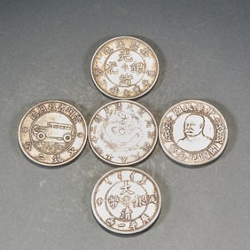 A Set of Five Silver Dollars
