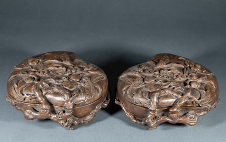 A Pair of Qing Yongzheng Reign Agarwood Lidded Boxes with Relief Fortune and Longevity Motifs