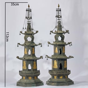 A Pair of Partial Gilt White Bronze Buddhist Pagodas
