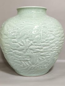 Qing Qianlong Reign Celadon Glazed Jar with "Dragon Teaching Son" Motif