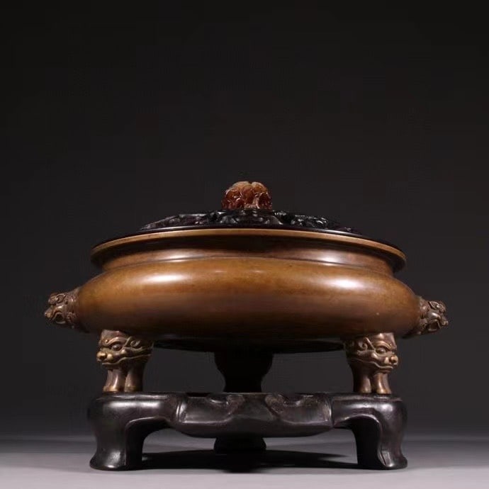 Imperial Use Mark Bronze Incense Burner with Lion Mask Handles: Imperial "Nei Yong" Marked Bronze Incense Burner with Lion-head Handles Cast from bronze and bearing the "Nei Yong" (For Imperial Use) mark, this incense burner features lion-head handles and a