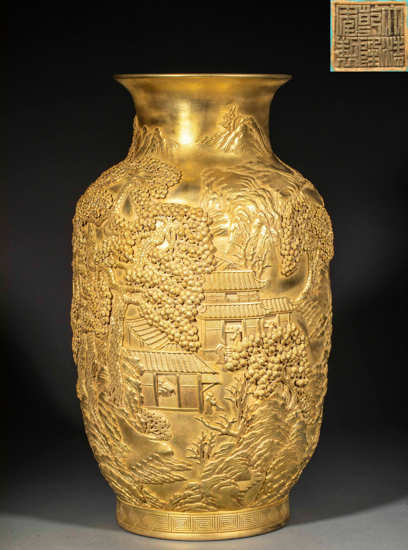 Qianlong Nian Zhi Lantern Vase with Carved Pavilions, Towers, and Maidens: Qianlong Period Gilt Porcelain Lantern Vase with Landscape and Figure Reliefs : Made of gilt porcelain and bearing the "Qianlong Nian Zhi" mark, this vase features high-relief scenes of pavilions and