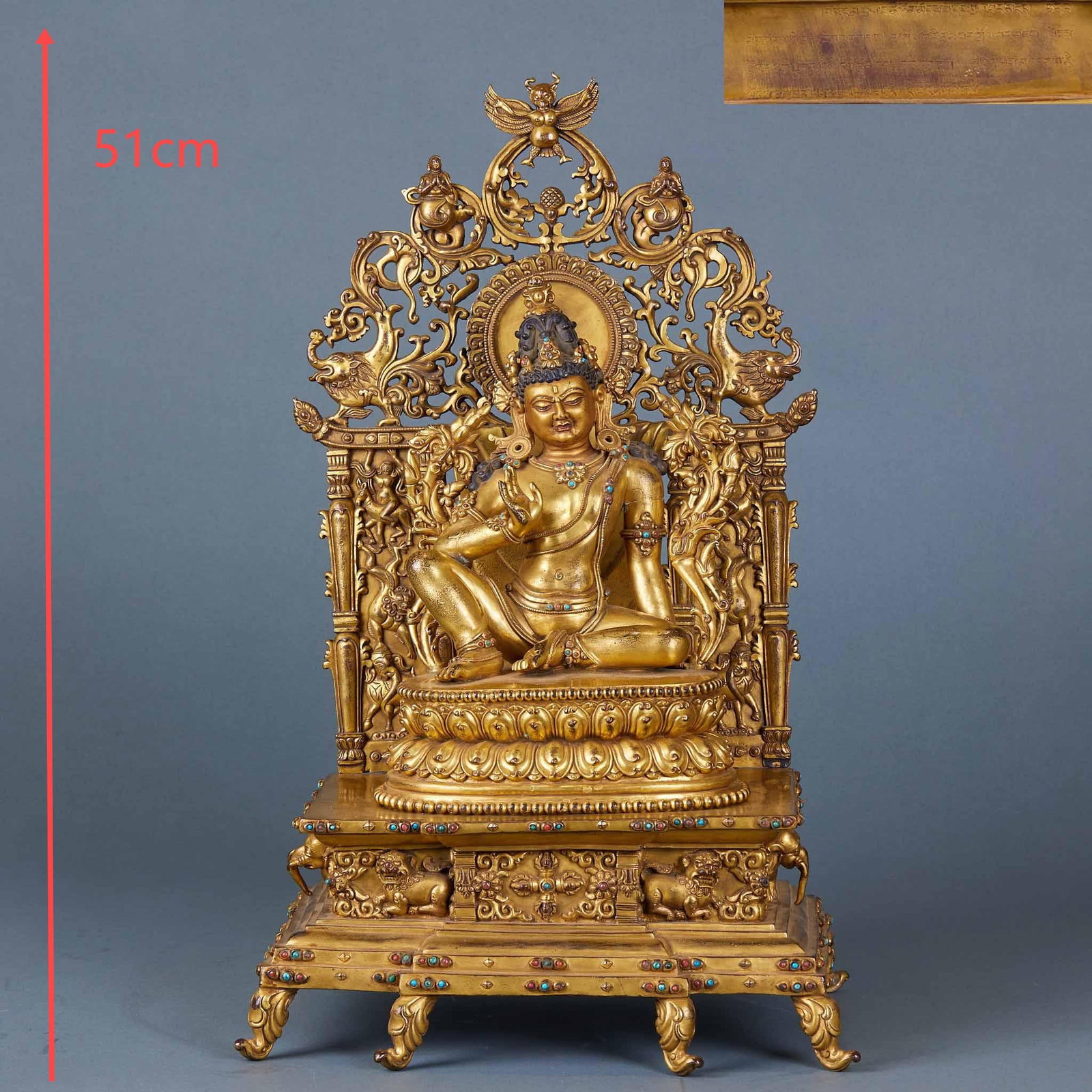 Gilt Bronze Green Tara on a High Platform: Gilt Bronze Green Tara Statue with High Platform and Mandorla : Cast from gilt bronze and inlaid with turquoise, this seated Green Tara statue rests on an elaborate high platform with an openwork mand