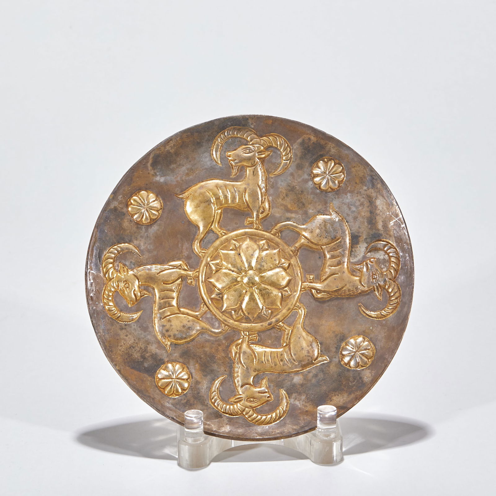 Gilt Silver Plate with Chiseled Ram Patterns: Gilt Silver Plate with Chiseled Ram Pattern: Material is gilt silver, carved with ram and lotus patterns via chiseling technique, height 1.5cm, diameter 18.2cm, weight 153g, cultural value: "ram" is