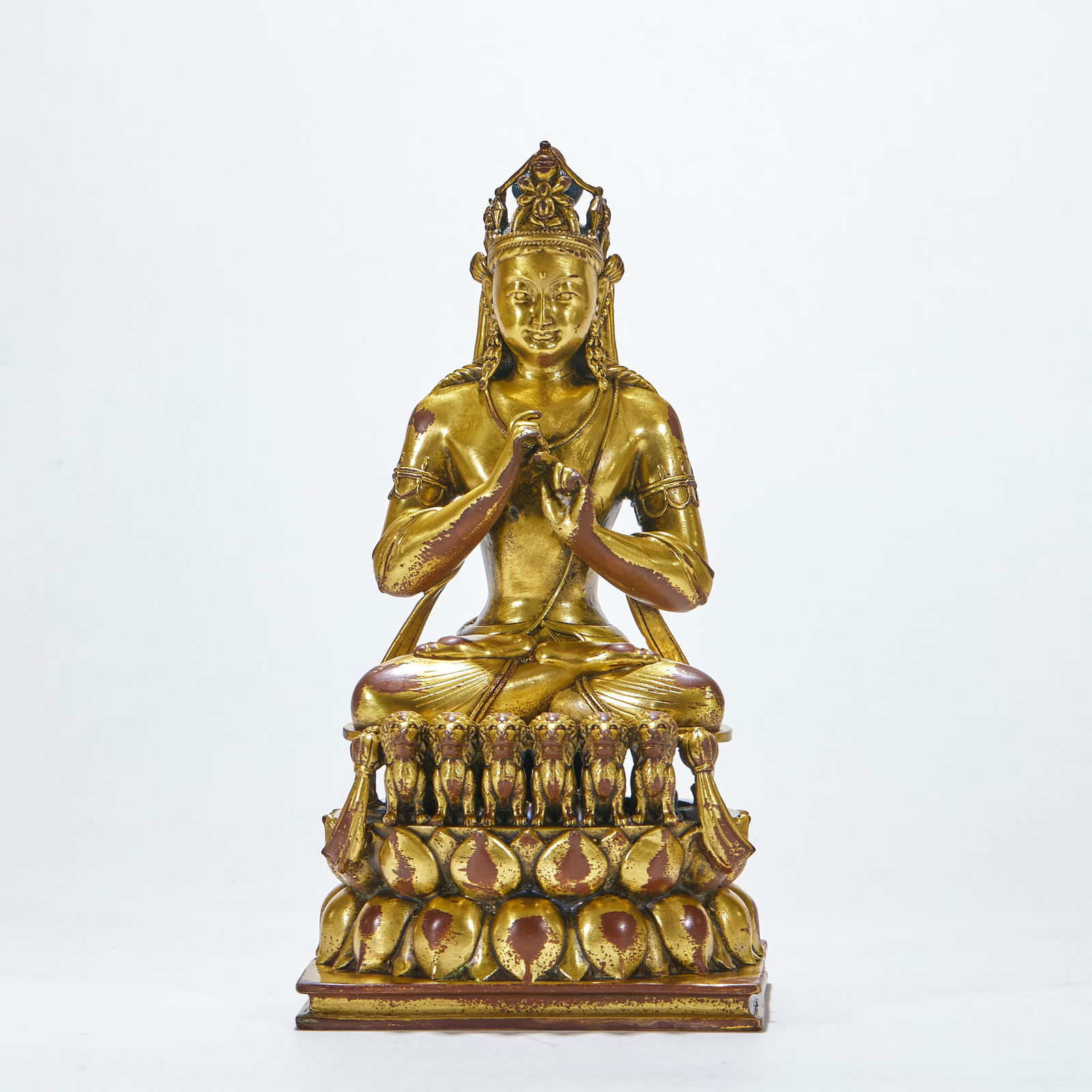 Gilt Bronze Guanyin Statue on Lion Throne: Gilt Bronze Guanyin Statue on Lion Throne: Made of copper via lost-wax casting and fully gilded, Guanyin sits cross-legged on the lion throne, featuring solemn and compassionate statue, specifications