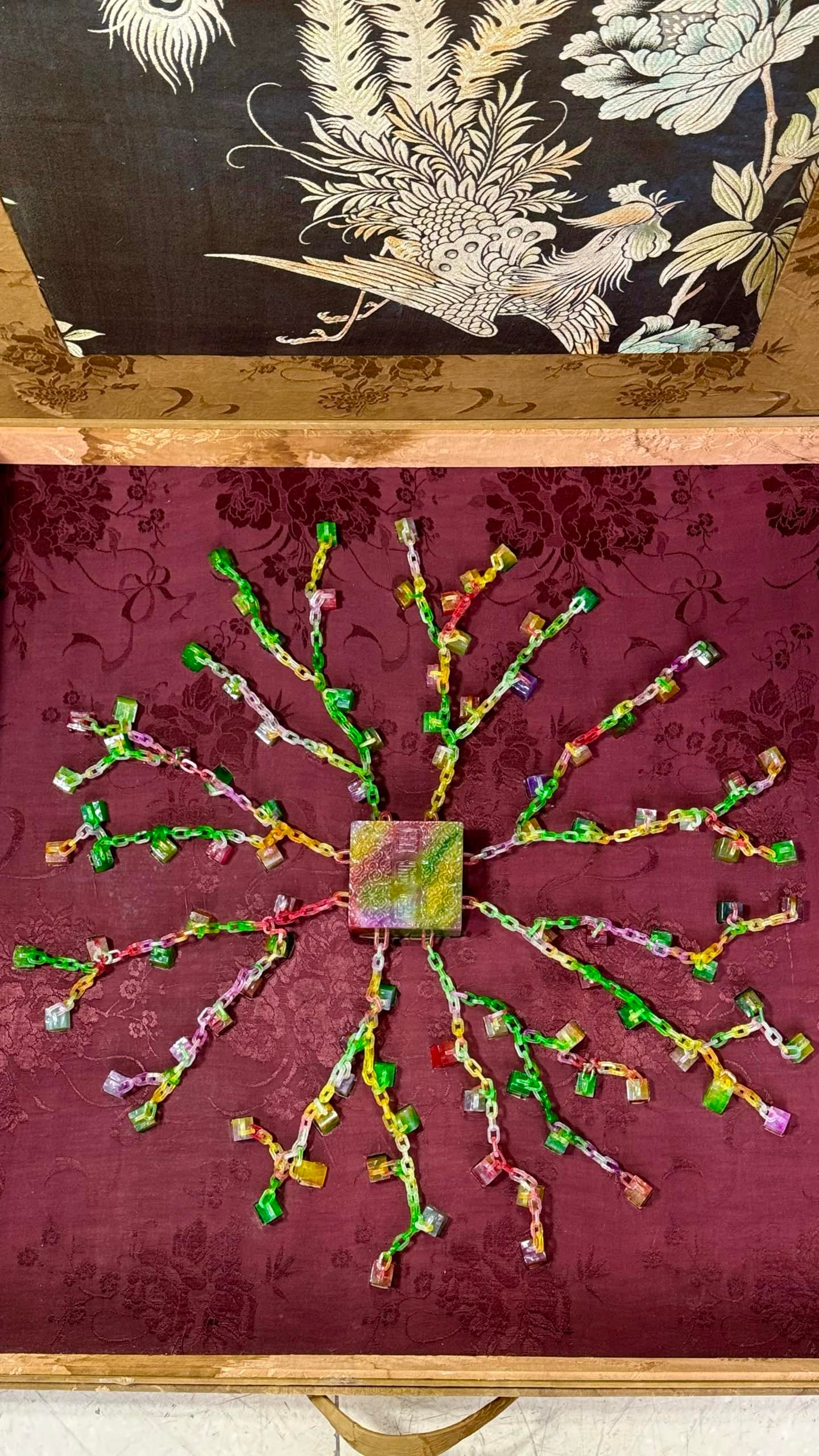 High Ice Multi-color Jadeite Set of Hundred Family Names Seals: High Ice Multi-Color Jadeite Set of Hundred Family Names Seals: Material is high ice multi-color jadeite, carved into a set of linked seals via chain carving technique, matched with a brocade box of