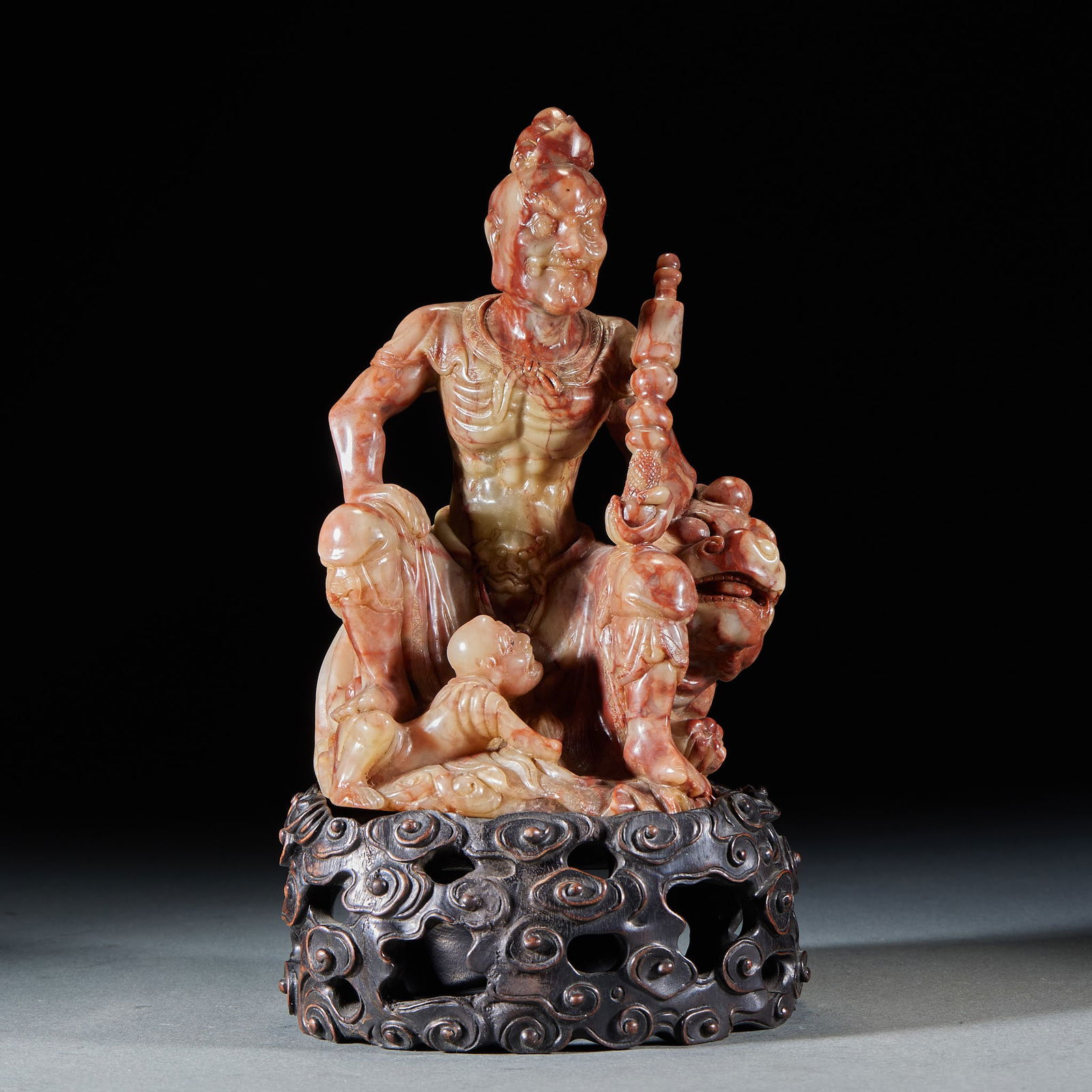 Shoushan Stone Ornament of Zhong Kui Catching Ghosts: Shoushan Stone Ornament of Zhong Kui Catching Ghosts: Made of Shoushan stone via round carving, depicting the theme of Zhong Kui catching ghosts, Zhong Kui sits on an auspicious beast with little ghos