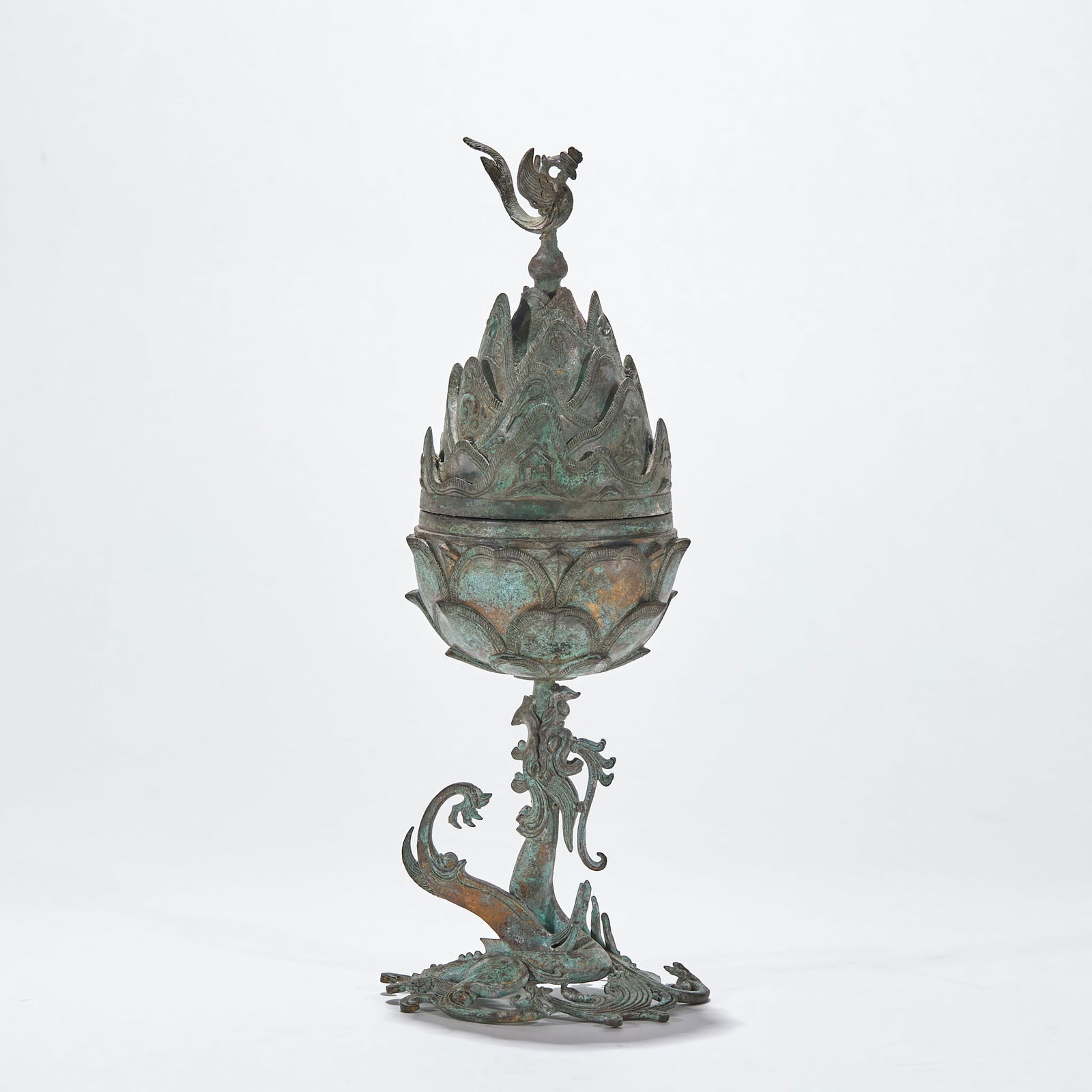 Pre-Ming Boshan Censer: Pre-Ming Boshan Censer: Made of bronze via mold casting, shaped as a classic Boshan censer, the cover is mountain-shaped (symbolizing the fairy mountain "Boshan" on the sea), with exquisite phoenix kn